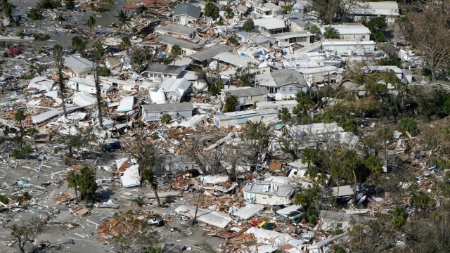 Damaged homes and debris are shown in the wake of Hurricane Ian in Florida.