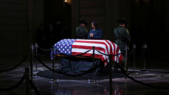 San Francisco Mayor London Breed prays over the casket of Sen. Dianne Feinstein
