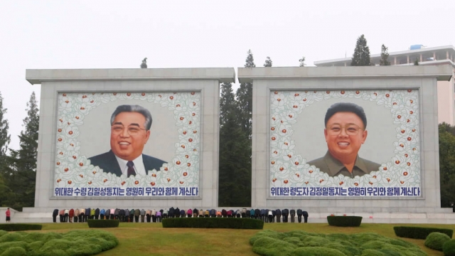 Portraits of North Korea's late leaders Kim Il Sung and Kim Jong Il
