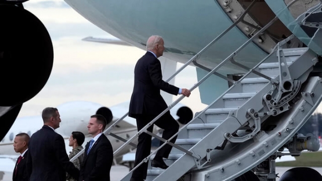President Joe Biden boards Air Force One as he departs for Israel