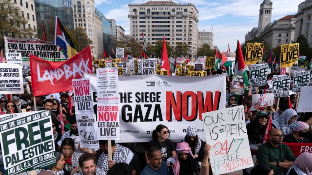 Anti-war activists rally during a pro-Palestinian demonstration asking to cease fire in Gaza, at Freedom Plaza in Washington.