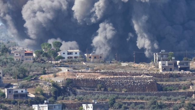 Black smoke rises from an Israeli airstrike on the outskirts of Aita al-Shaab.