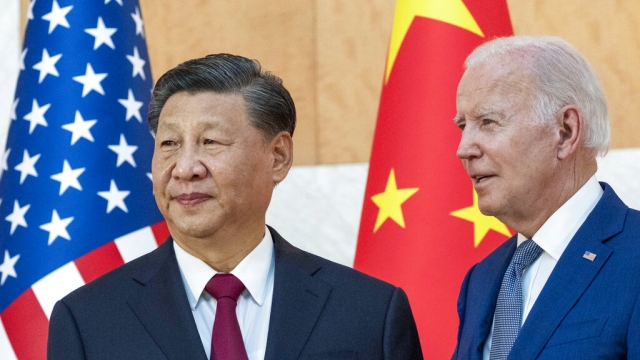 U.S. President Joe Biden, right, stands with Chinese President Xi Jinping before a meeting on the sidelines of the G20 summit