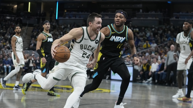 Milwaukee Bucks' Pat Connaughton and Indiana Pacers' Bruce Brown
