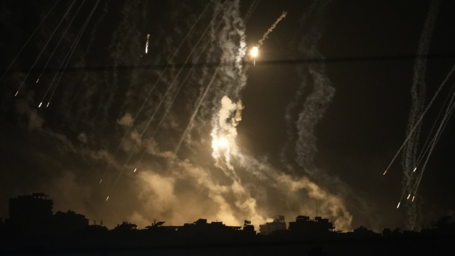 Smoke and flares rise over Gaza City during an Israeli strike in the Gaza Strip, as seen from southern Israel, Nov. 10, 2023