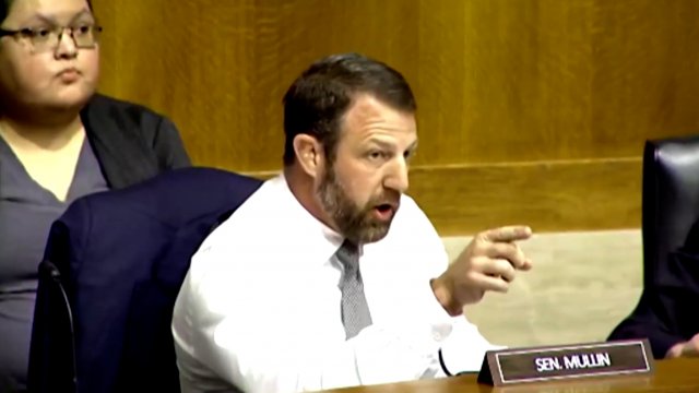Sen. Markwayne Mullin points during a hearing in which he challenged the Teamsters president to a fight.