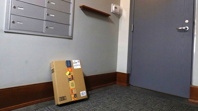 An Amazon package sits by the mailbox at Jason Goldberg's Chicago apartment.