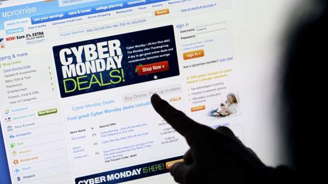 A consumer looks at Cyber Monday sales on the computer