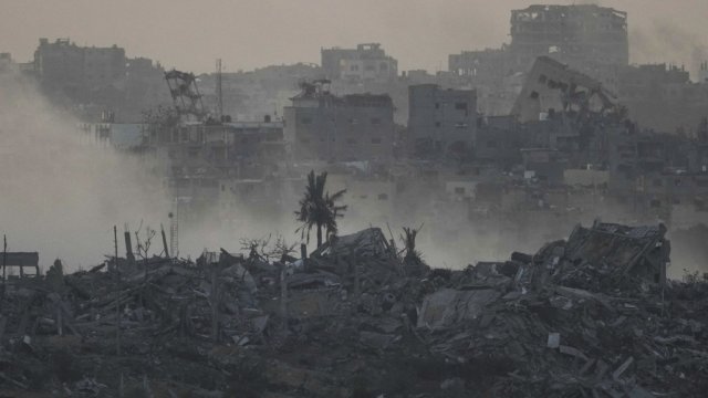 Smoke rises following an Israeli bombardment in the Gaza Strip, as seen from southern Israel, Saturday, Dec. 2, 2023.