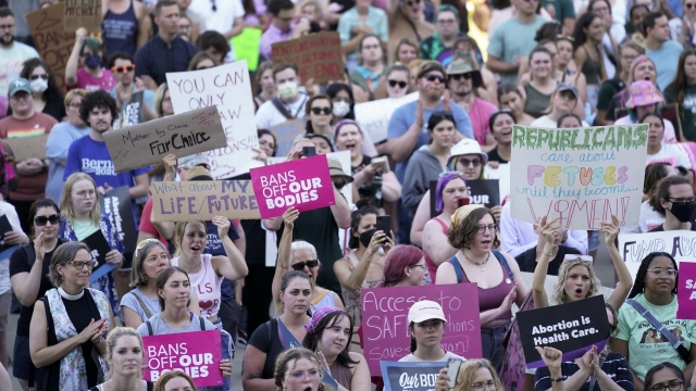 Abortion rights protesters attend a rally