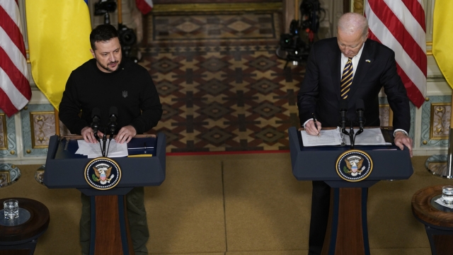 Ukrainian President Volodymyr Zelenskyy withs with U.S. President Joe Biden