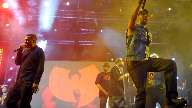 File photo of members of the Wu-Tang Clan performing on stage.