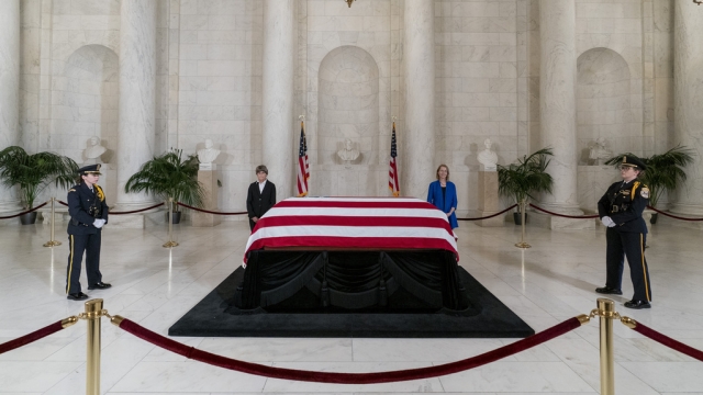 The flag-draped casket of retired Supreme Court Justice Sandra Day O'Connor