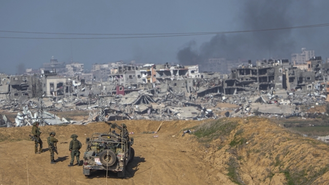Israeli army troops are seen near the Gaza Strip border, in southern Israel.
