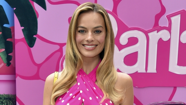 Margot Robbie arrives at a photo call for the movie "Barbie."