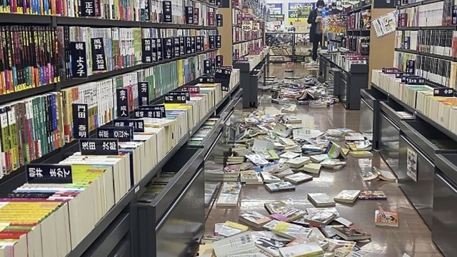 Books are scattered at a bookstore in Niigata, Japan, following an earthquake Monday.