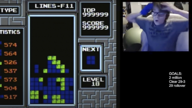 13-year-old gamer Willis Gibson reacts after "beating" the video game Tetris.