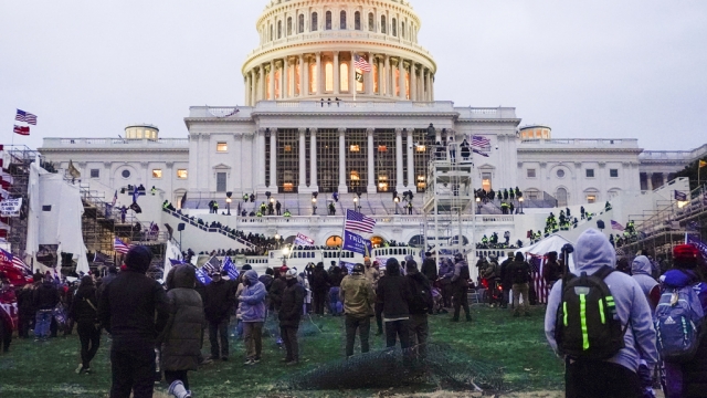 Rioters walk on the West Front at the U.S. Capitol on Jan. 6, 2021.