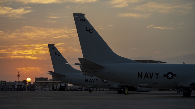Poseidon maritime patrol and reconnaissance aircraft parked on a flight line in the U.S. 5th Fleet area of operations.