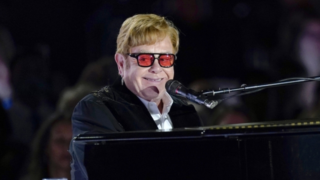 Elton John performs.