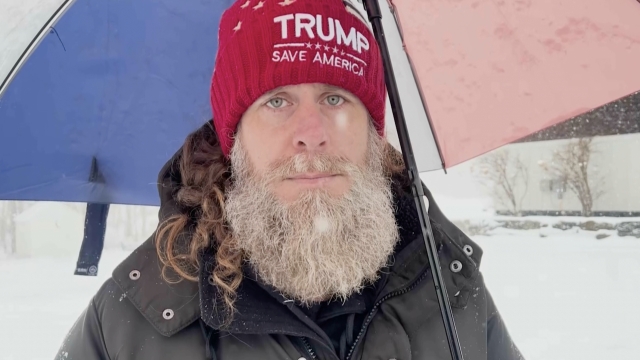 A Trump supporter standing in the snow