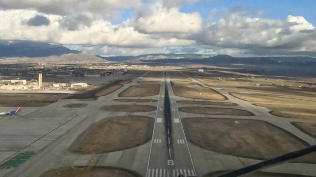 A plane approaching a runway.