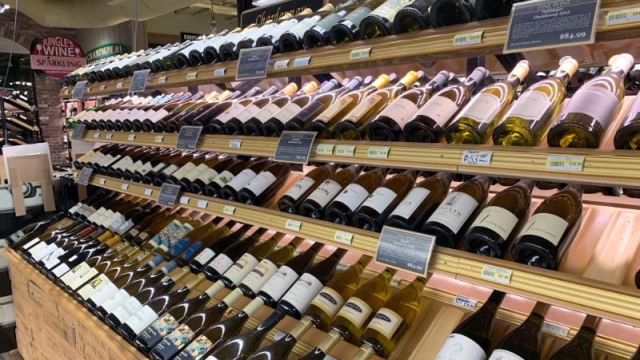 Bottles of wine displayed at a store.