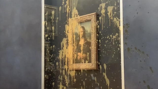 A view of the scene after activists hurled soup at the glass protecting the Mona Lisa, at the Louvre Museum, in Paris