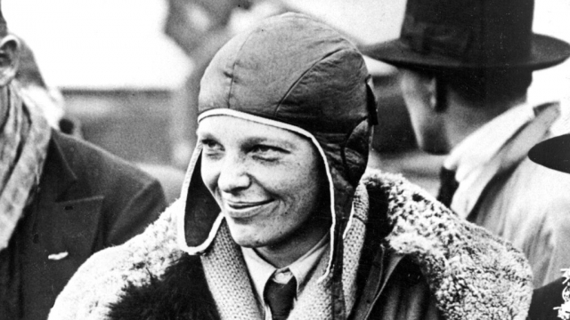 Amelia Earhart poses for photos.