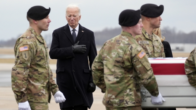 Pres. Joe Biden watches as an Army carry team moves the transfer case containing the remains of a soldier killed in Jordan.