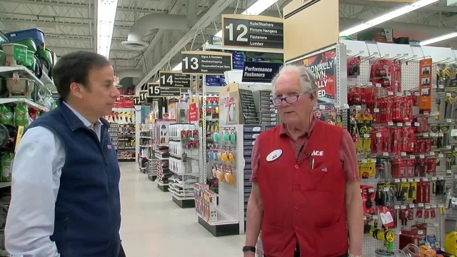 Ace Hardware's Ed Rooch chats with reporter John Matarese.