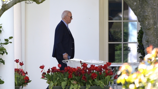 President Joe Biden walks to the Oval Office.