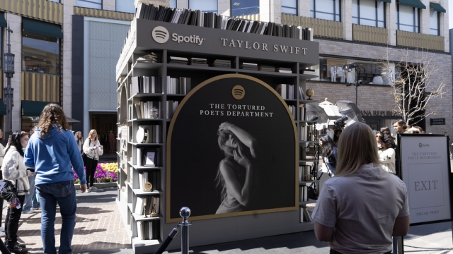 Taylor Swift fans check out a pop-up opening to celebrate her upcoming album "The Tortured Poets Department."