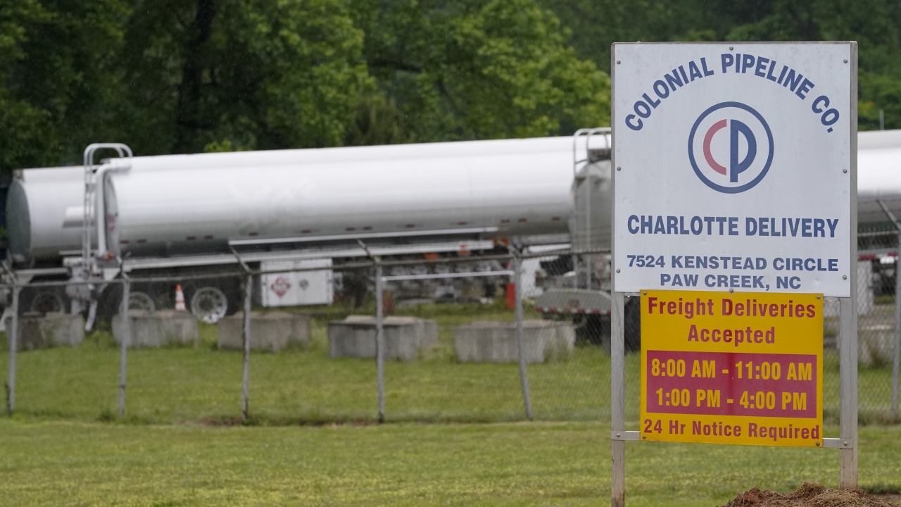 Tanker trucks parked near the entrance of Colonial Pipeline Company.