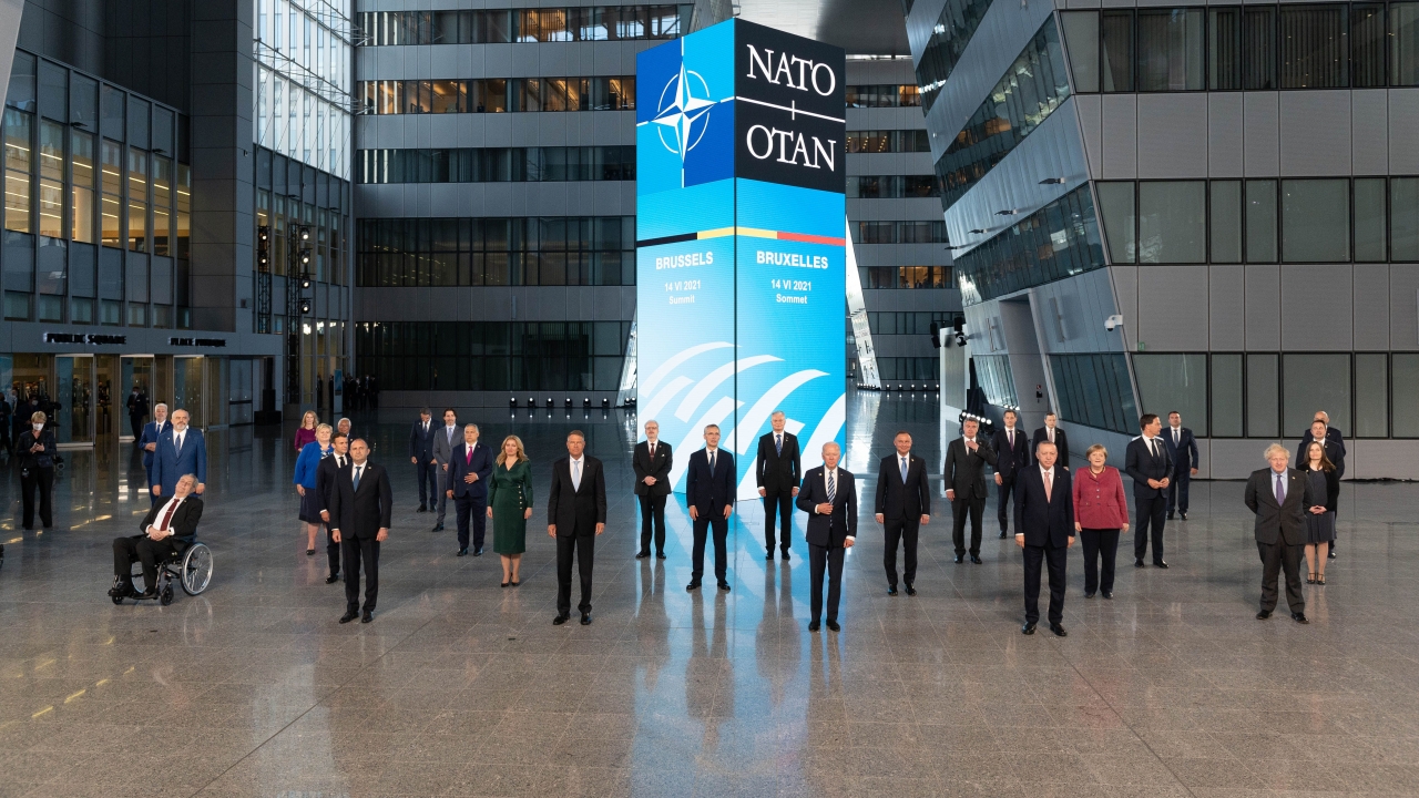 Leaders pose during a family picture at the NATO headquarters.