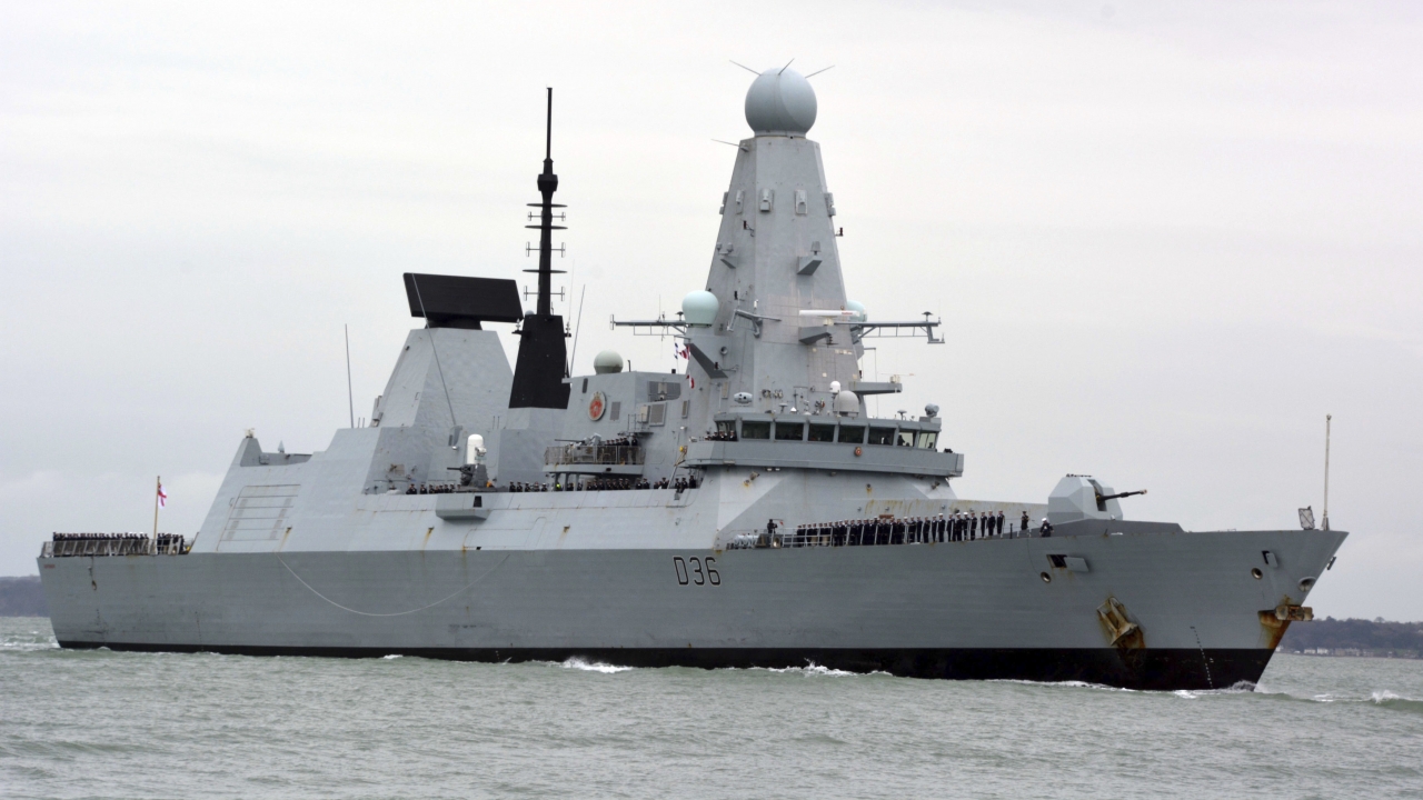 HMS Defender in Portsmouth, England. The Russian military says its warship has fired warning shots and a warplane dropped bom