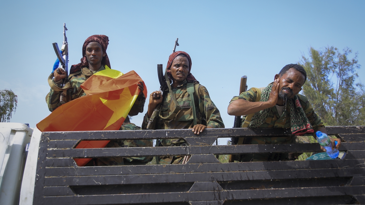 Tigray forces ride in a truck after taking control of Mekele