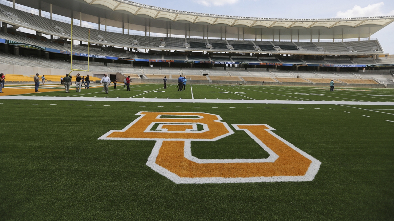 The Baylor University logo is displayed on the football field at McLane Stadium in Waco, Texas.
