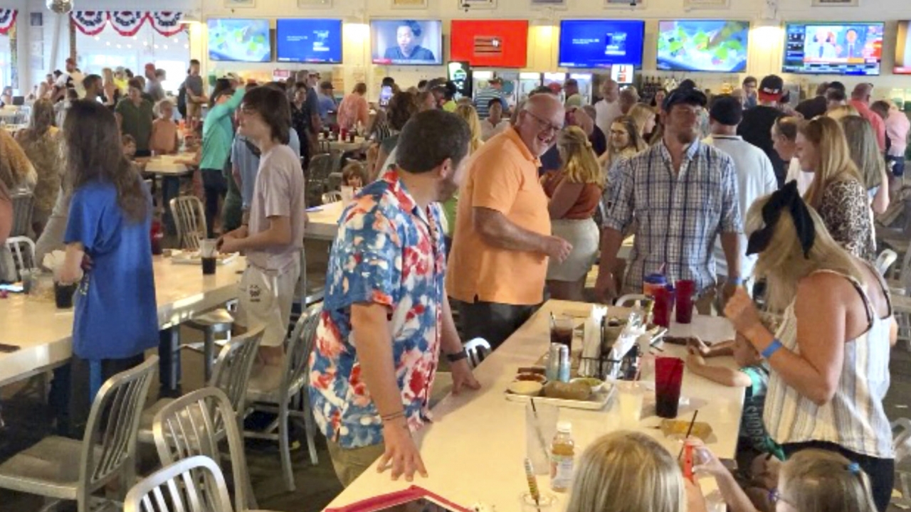 Customers dance inside The Hangout, a popular restaurant in Gulf Shores, Ala.