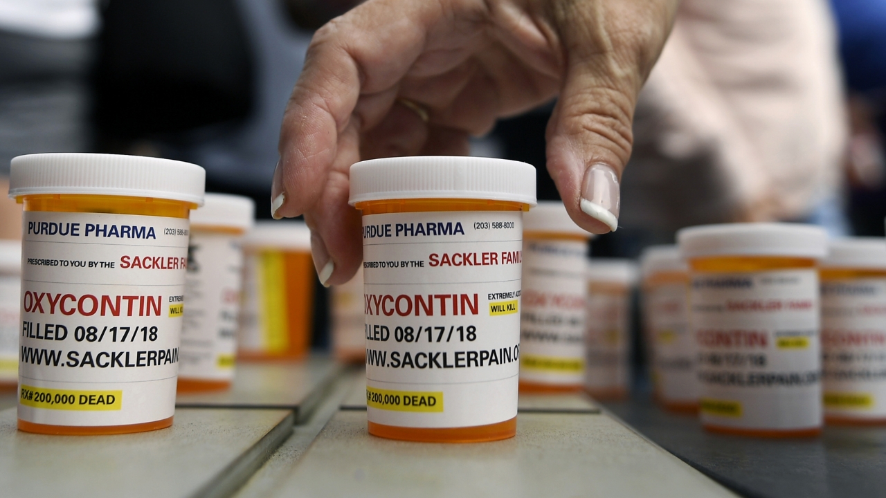 Pill bottles at a protest against Oxycontin, Purdue Pharma and the Sackler family.