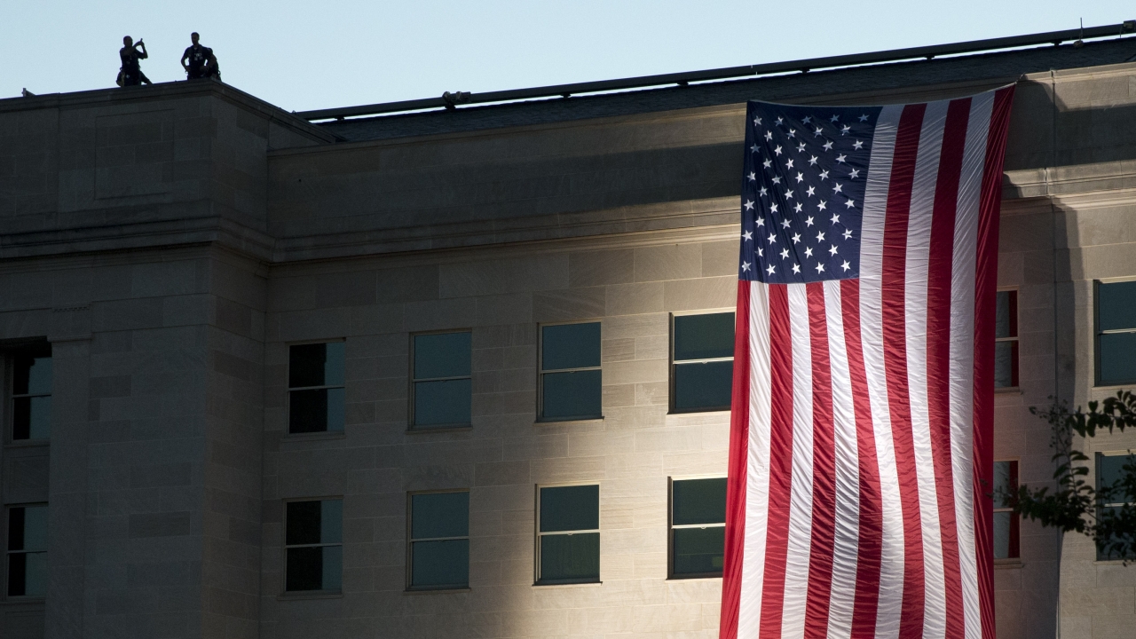 On Sept. 11, 2015, an American flag is draped on the side of the Pentagon where the building was attacked Sept. 11, 2001.