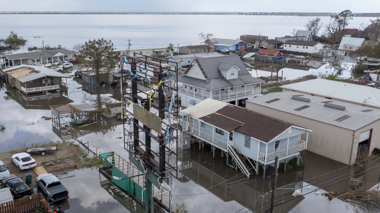 Flood waters surround storm damaged homes in Lafourche Parish, Louisiana.