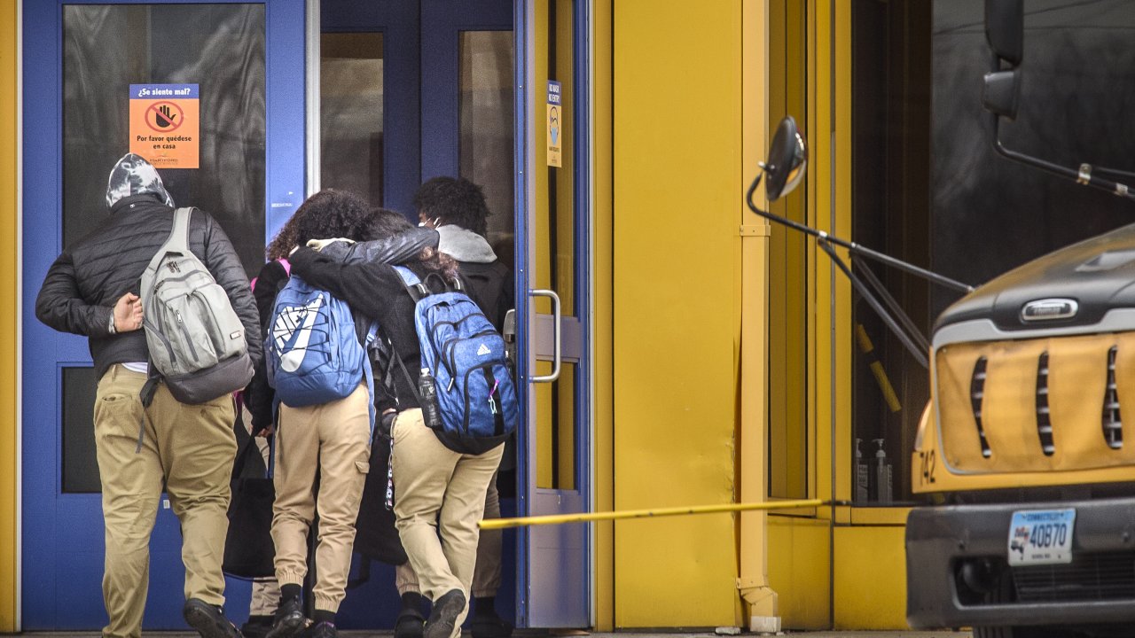 Students at Sport and Medical Sciences Academy in Hartford, Conn., return to school after it closed due to a student overdose