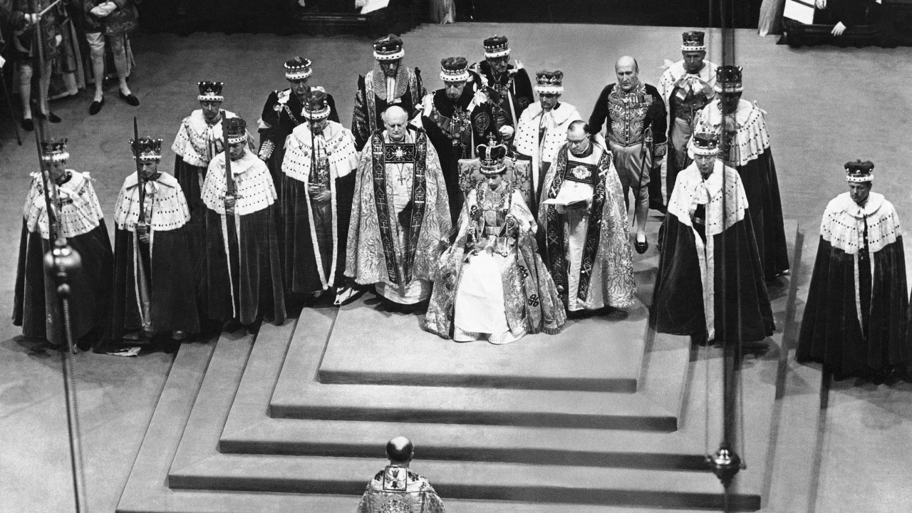 Queen Elizabeth II sits on throne after her coronation June 2, 1953.