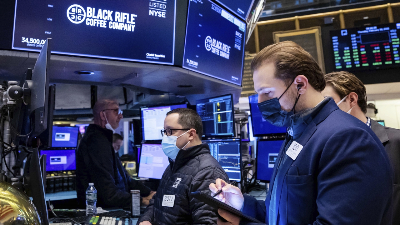 Traders work on the floor at New York Stock Exchange.