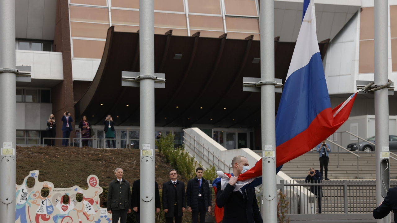 Employees of the Council of Europe remove the Russian flag from the Council of Europe building.