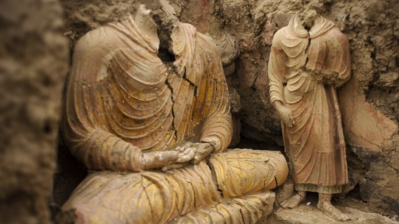 Buddha statues are seen inside an ancient temple in Mes Aynak valley.