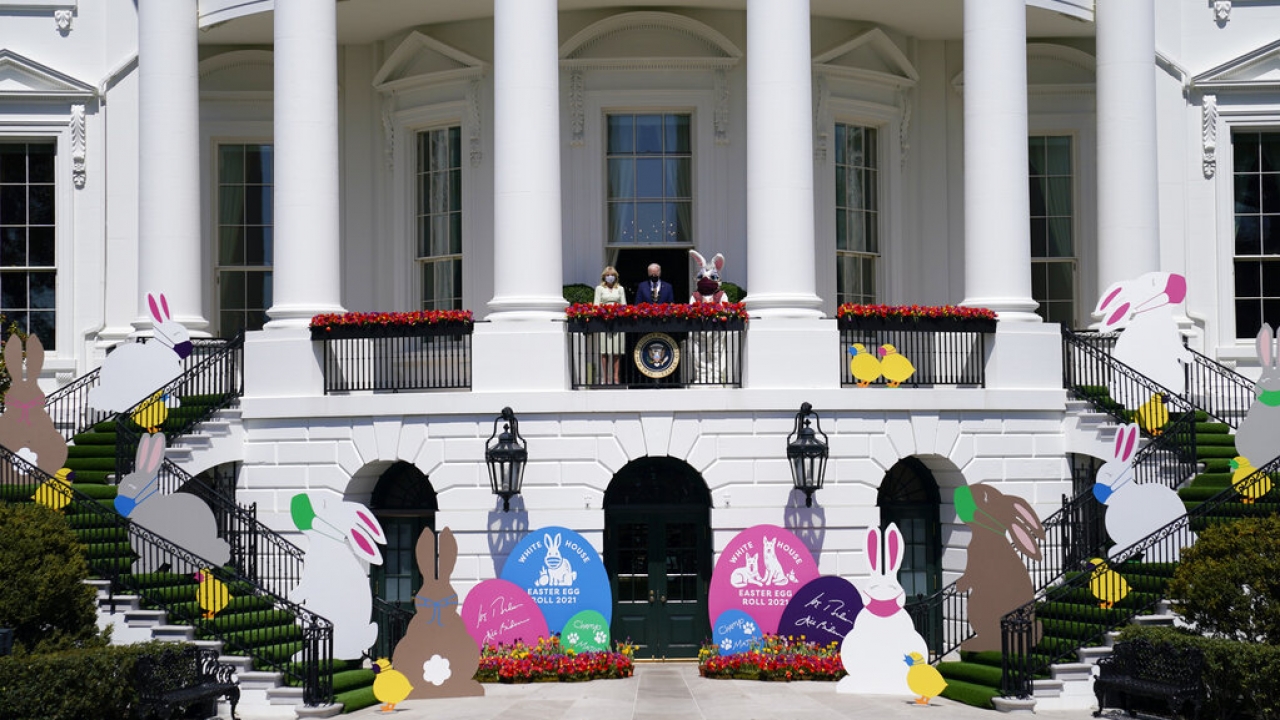 President Joe Biden with first lady Jill Biden and the Easter Bunny on the Blue Room balcony at the White House.