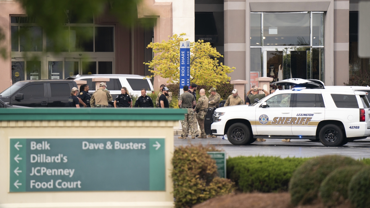 Members of law enforcement gather outside Columbiana Centre mall in Columbia, S.C.