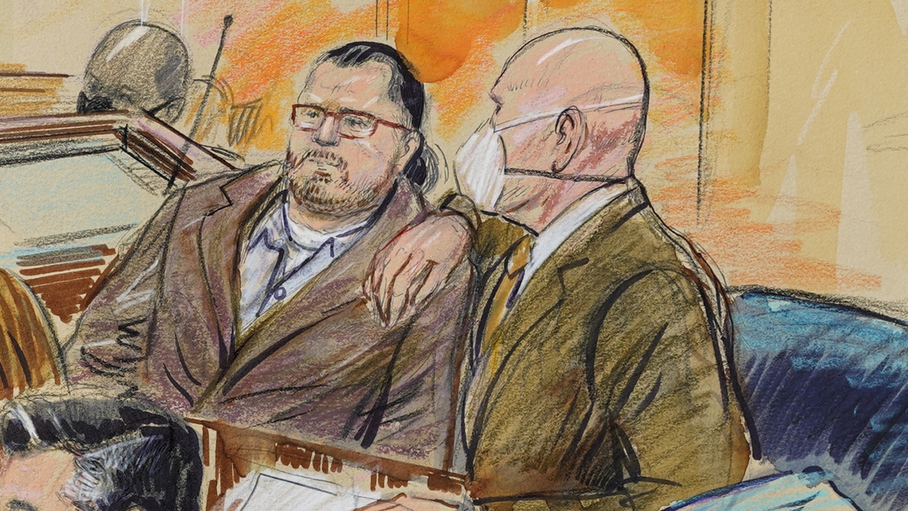 Artist sketch depicts Guy Wesley Reffitt, joined by his lawyer William Welch.